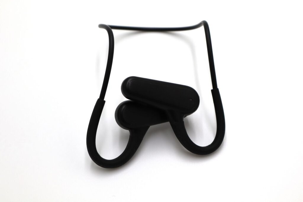 Modern black wireless headphones designed for comfort and style, ideal for digital audio experiences.